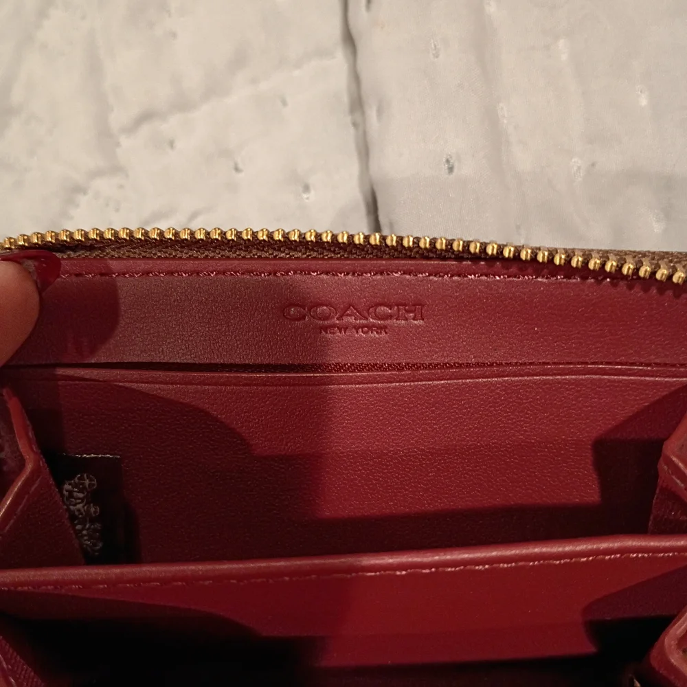 Coach compact zip